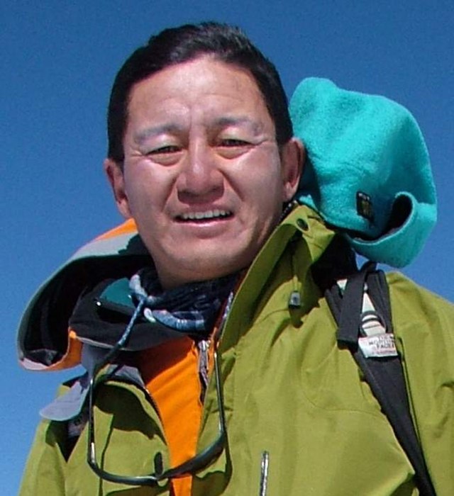 TENZING NORGAY FIRST TO CLIMB EVEREST